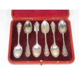 A Boxed Set Of Decorative Silver Spoons