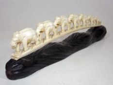 A 19thC. Carved Ivory Tusk Depicting A Chain Of El