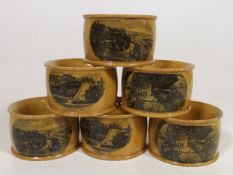 A Set Of Six Mauchline Ware Napkin Rings Depicitin