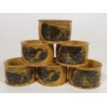 A Set Of Six Mauchline Ware Napkin Rings Depicitin