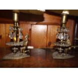 A Pair Of Brass & Crystal Lamps