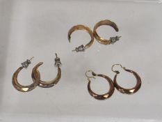 Three Pairs Of Yellow Metal Earrings