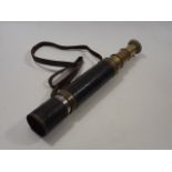 A Three Draw Brass Leather Bound Telescope