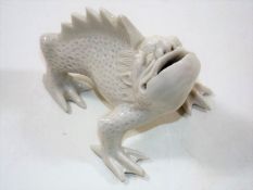 A Chinese Blanc De Chine Porcelain Lizard Figure