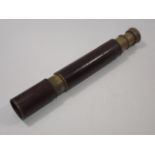 A Two Draw Brass Leather Bound Telescope