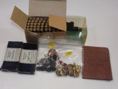 A Boxed Quantity Of Items Of Military Interest