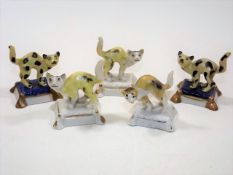 Five Small Early 20thC. Porcelain Cat Figures On P