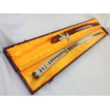 A Boxed Curved Blade Samurai Sword