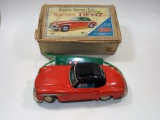 A Tin Plate Remote Control Mercedes Benz Car With