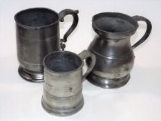 A Pot Bellied Pewter Tankard & Two Other Pieces Of