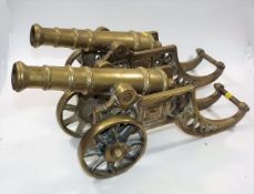 A Pair Of Large Brass Canons