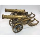 A Pair Of Large Brass Canons