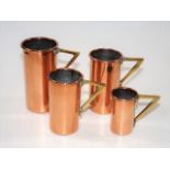 Four Arts & Crafts Style Copper & Brass Measures