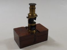 An Early 19thC. Brass Field Microscope With Mahoga