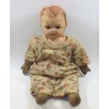 An Antique Doll With Clothes A/F