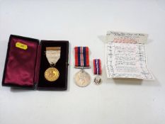 A WW2 Medal Awarded To Naval Nurse M. Macadam Twin
