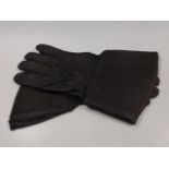 A Pair Of Leather War Time Motorcycle Gloves