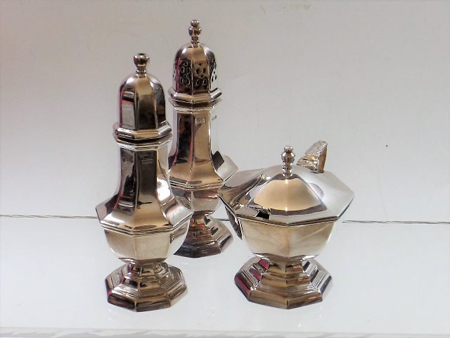 An Octagonal Silver Cruet Set