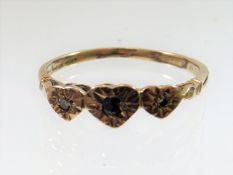 A 9ct Gold Ring With Small Sapphire & Diamonds
