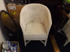 A Lloyd Loom Chair Twinned With Lloyd Loom Basket