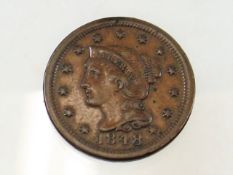 An 1848 Liberty Head Penny