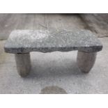 A Free Standing Pink Granite Garden Bench With Ton