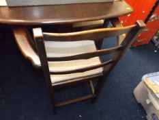 An Ercol Dining Table & Chair Set £30-40