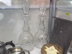 A Pair Of Cut Glass Edwardian Decanters