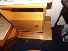 A Bedside Cabinet Twinned With Small Chest Of Draw