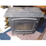 A Cast Iron Log Burner Twinned With One Other