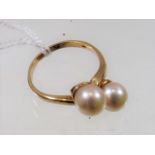 A 9ct Gold Ring With Two Pearls