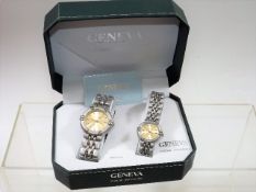 A Boxed His & Hers Wrist Watch Set