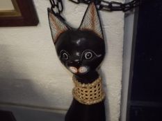 A Decorative Carved Wood Model Of A Cat