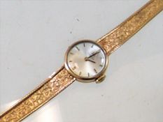 A Ladies 9ct Gold Tissot Watch