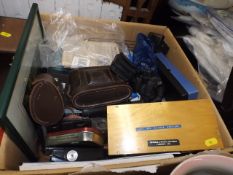 A Boxed Quantity Of Vintage Cameras & Other Relate
