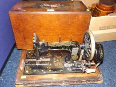 A Fristers Rossman Sewing Machine and Clock Movement