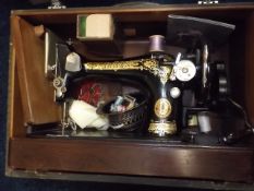 A Boxed Singer Sewing Machine