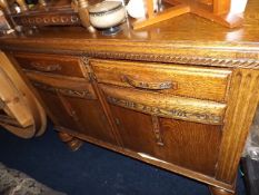 A 1930'S Oak Sideboard With Two Drawers & Cupboard