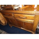 A 1930'S Oak Sideboard With Two Drawers & Cupboard