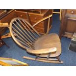 An Ercol Rocking Chair Twinned With Ercol Armchair