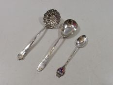 A Silver Sugar Sifter & Two Other Silver Spoons
