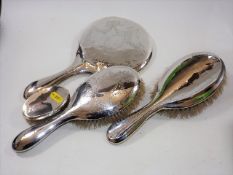 A Silver Backed Dressing Table Set & One Other Bru