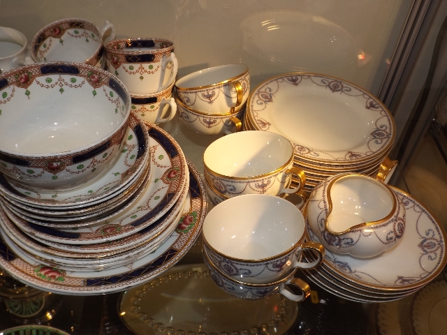 A Collection Of French Porcelain Cups & Saucers Tw
