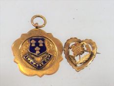 A 9ct Gold Pyke Cup Football Winners Medal & A Sma