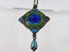 An art nouveau silver enamelled pendant by James F