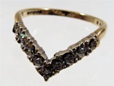 A V shaped 9ct gold & diamond ring