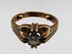 A 9ct gold ring set with diamond