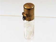 An antique etched scent bottle with yellow metal f