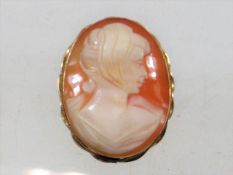 A gold mounted cameo brooch
