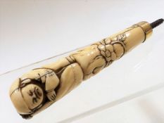 A c.1900 Japanese ivory parasol handle